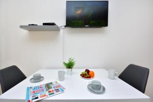 TV a/nebo společenská místnost v ubytování Solis