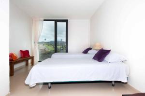 Łóżko lub łóżka w pokoju w obiekcie Salobre Villas Deluxe