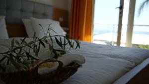 Postel nebo postele na pokoji v ubytování Hotel Ionian