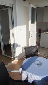 Kuchyň nebo kuchyňský kout v ubytování Apartmani Šipić , Bilo - Primošten