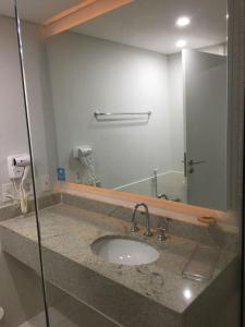 Et badeværelse på Flat Conforto em Itaipava