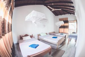 Postel nebo postele na pokoji v ubytování Rupa's Hotel + 37 fotografií