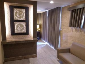 Posezení v ubytování Maple Hotel