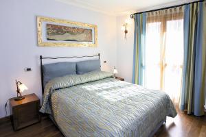 Postel nebo postele na pokoji v ubytování Villa Teresa