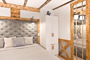 Posteľ alebo postele v izbe v ubytovaní Apartament 511 Prosta