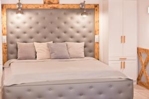 Posteľ alebo postele v izbe v ubytovaní Apartament 511 Prosta
