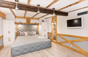 Posteľ alebo postele v izbe v ubytovaní Apartament 511 Prosta