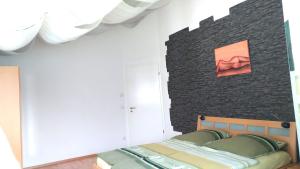 Postel nebo postele na pokoji v ubytování FeWo - bei Tati 95qm