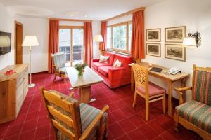 Posezení v ubytování Hotel Lech & Residenz Chesa Rosa
