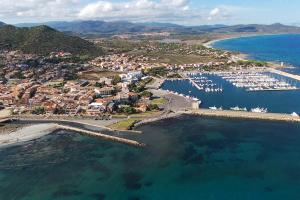 an aerial view of a harbor with boats in the water at Phiniscollis B&B in La Caletta