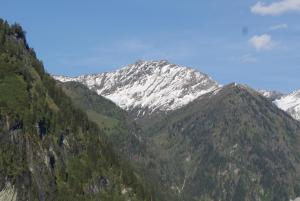 a mountain with snow on top of it at Bauerndörfl Hüttschlag in Hüttschlag