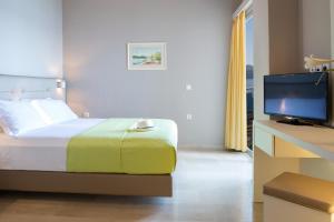Säng eller sängar i ett rum på Adriatica Hotel