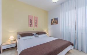 Postel nebo postele na pokoji v ubytování Villa Lukas + 29 fotografií