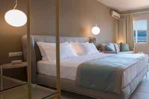 Säng eller sängar i ett rum på Adriatica Hotel