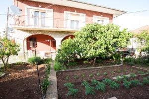 Vonkajšia záhrada v ubytovaní Apartments Aria