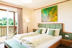 Cama o camas de una habitación en Weingut Dreisiebner Stammhaus