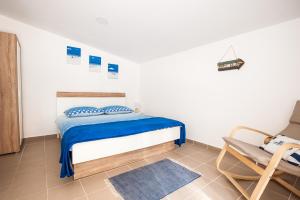 Posteľ alebo postele v izbe v ubytovaní Apartments Aria
