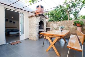 Patio alebo iná vonkajšia časť ubytovania Apartments Aria