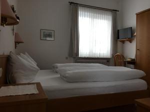 Postel nebo postele na pokoji v ubytování Pension Wachter