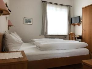 Postel nebo postele na pokoji v ubytování Pension Wachter