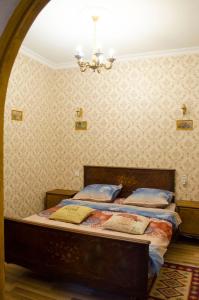 Кровать или кровати в номере Апарт - Отель Светлейший Князь Грузинский