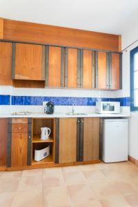 Kuchyň nebo kuchyňský kout v ubytování Bimbolla Apartaments