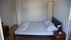 Postel nebo postele na pokoji v ubytování Apartmani Šipić , Bilo - Primošten