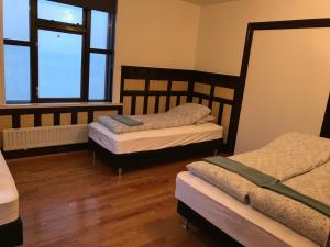 Lava Guesthouse客房内的一张或多张床位