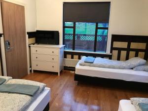 Lava Guesthouse客房内的一张或多张床位