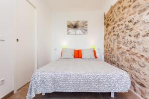 A bed or beds in a room at Sa Volta Nova