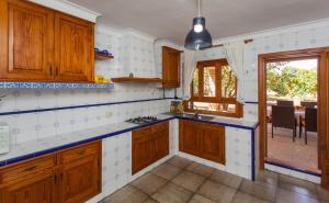 A kitchen or kitchenette at Sa Volta Nova