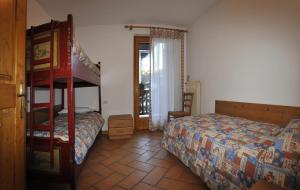 Postel nebo postele na pokoji v ubytování Residenza Al Castello