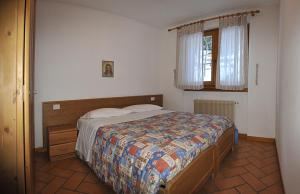 Postel nebo postele na pokoji v ubytování Residenza Al Castello