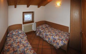 Postel nebo postele na pokoji v ubytování Residenza Al Castello