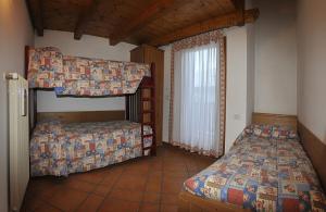 Postel nebo postele na pokoji v ubytování Residenza Al Castello