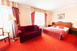Posteľ alebo postele v izbe v ubytovaní Hotel Żubrówka Spa & Wellness