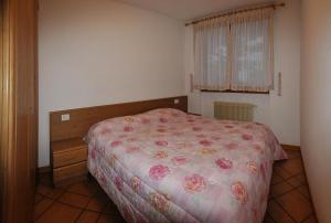 Postel nebo postele na pokoji v ubytování Residenza Al Castello