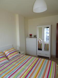Posteľ alebo postele v izbe v ubytovaní Apartment Marisol L'Ampolla