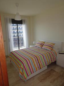 Posteľ alebo postele v izbe v ubytovaní Apartment Marisol L'Ampolla + 16 fotografií