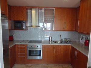 Kuchyňa alebo kuchynka v ubytovaní Apartment Marisol L'Ampolla