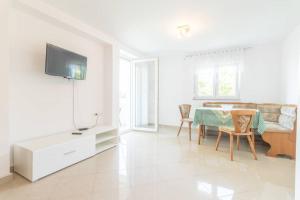 TV a/nebo společenská místnost v ubytování BUTO br. 1 (4 pax)