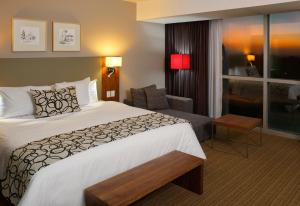 Postel nebo postele na pokoji v ubytování Casa Inn Premium Hotel Queretaro