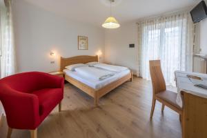 מיטה או מיטות בחדר ב-Hotel Untermelz