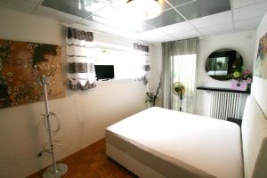 Ein Bett oder Betten in einem Zimmer der Unterkunft Designerwohnung in Grün mit großer Terrasse