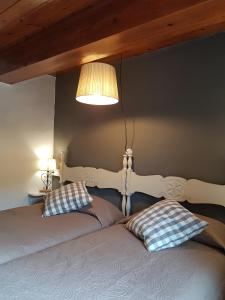 Cama o camas de una habitación en Apartaments Can Bundanci