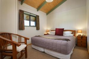 Postel nebo postele na pokoji v ubytování Longbourne Lodge Motel Mosgiel
