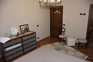 Postel nebo postele na pokoji v ubytování La Torre Rooms + 7 fotografií
