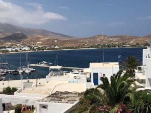 a view of a harbor with boats in the water at Marina's Studios Serifos in Livadi