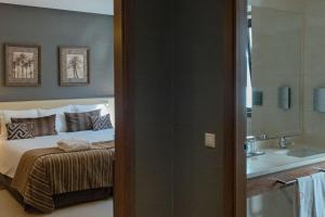 Cama ou camas em um quarto em Your Hotel & Spa Alcobaça
