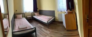 Postel nebo postele na pokoji v ubytování Hotel Amarillis
